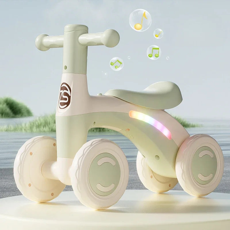 Anti-Tip Baby Balance Bike Ages 1-3 4-Wheel Silent Glider Walker Toy Toddler Training Ride-On with Safety Wheels Indoor Outdoor